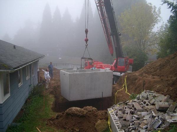 House 9.24.04 00022.JPG - And started dropping things into the pit.